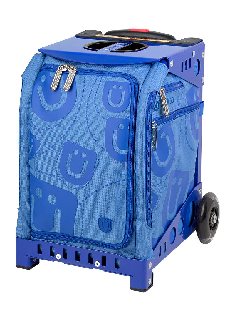 a blue suitcase sitting on a blue surface 