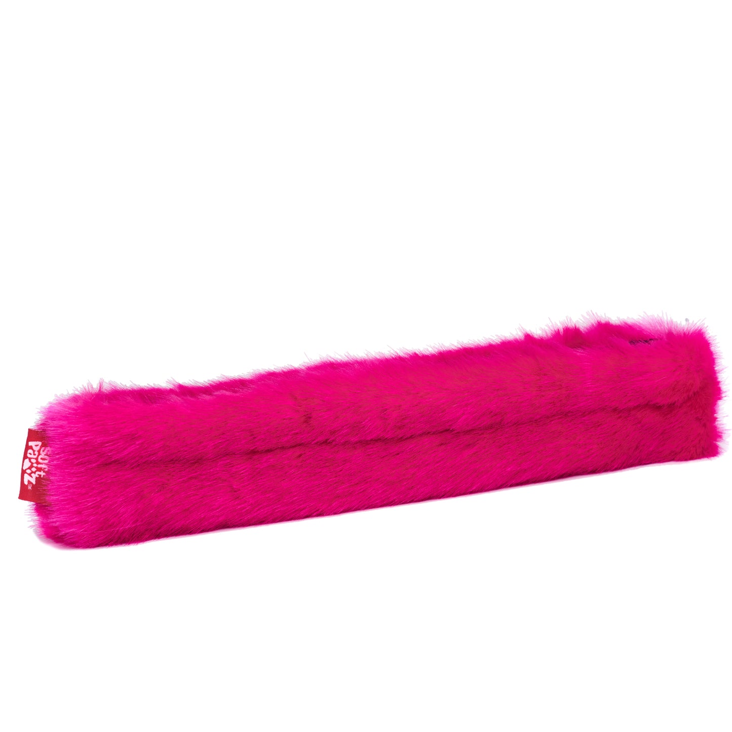 a pink toothbrush is sitting on a white surface 