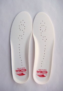 a close up of a pair of white shoes 