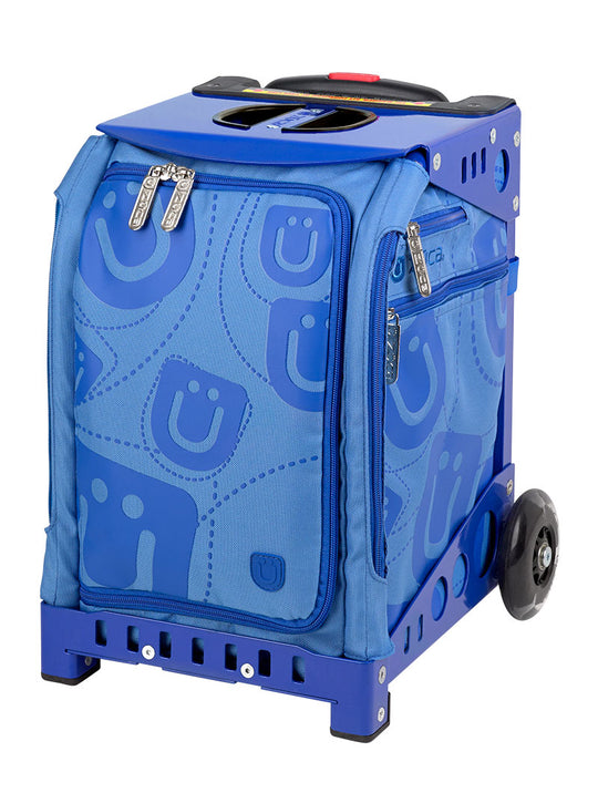 a blue suitcase sitting on a blue surface 