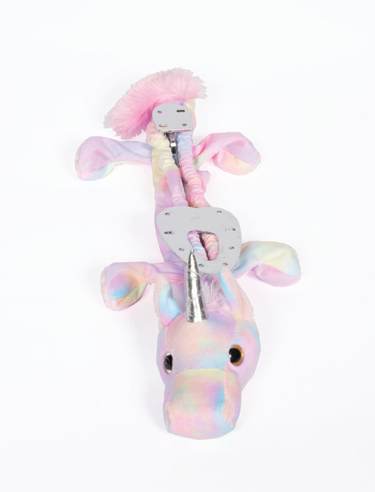 a pair of scissors and a pink ribbon 