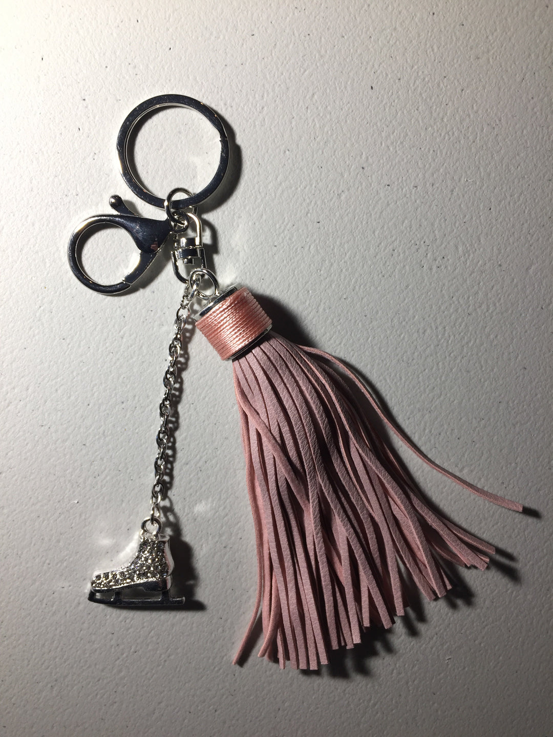 a pair of scissors are hanging on a wall 