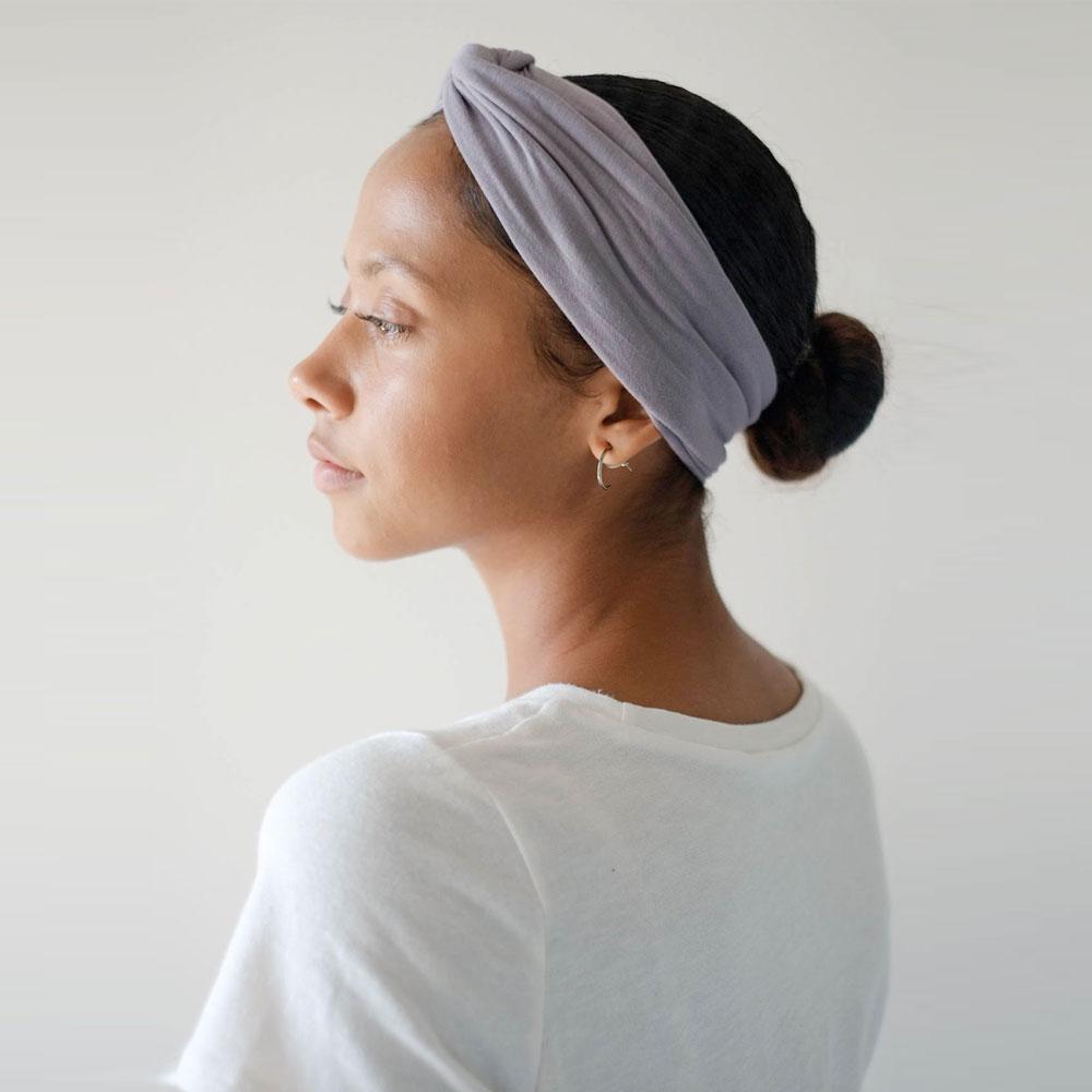 a woman wearing a hat and a hat 
