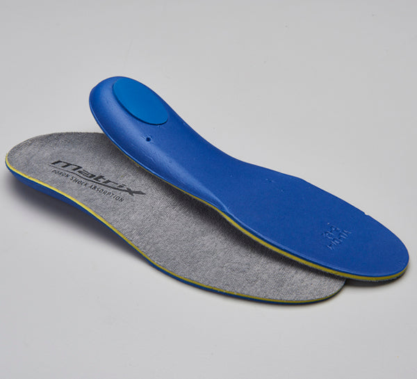 a blue pair of blue handled scissors on a white surface 