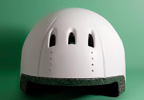 a white toaster oven sitting on top of a green counter 